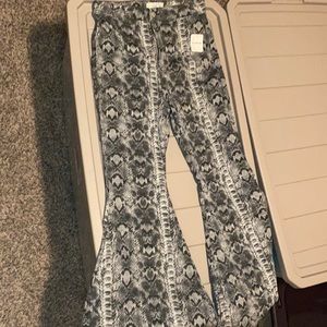 Free People Black Snakeskin Bell Bottoms size 30